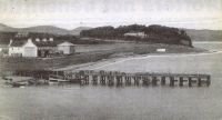 Circa late 1930's. The old wooden pier and the first council house (1 & 2 Kyleside) next to the Kings Arms Hotel.a 1930. The Kings Arms Hotel (note cow grazing in front). 
