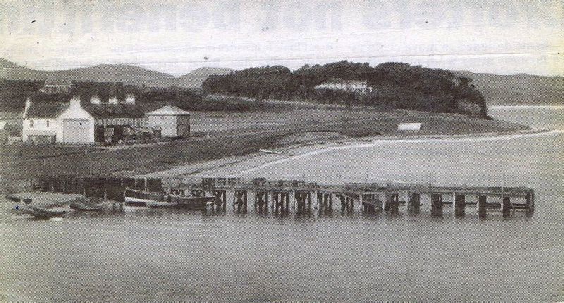Circa late 1930's. The old wooden pier and the first council house (1 & 2 Kyleside) next to the Kings Arms Hotel.
