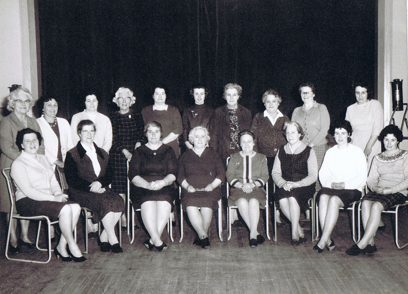 Mid 1960's - Kyleakin SWRI in Refurbished Village Hall:
Standing left to right:  Nan Smith, Mena MacLean, Anges Soper, Jen Stark, Cathie Reid, Jessie MacDonald, Annie MacInnes, Bella MacColl, Annabelle Nicolson and Mary Ellen MacIntosh
Sitting left to right:  Morag Macrae, Mabel MacLean, Annie Grant, Teenie Reid, Peggy MacPherson, Kay Reid, Anna Belle Robertson and Morag MacKenzie