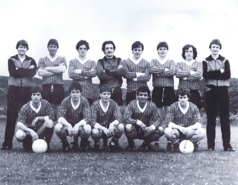 Circa 1983 - Kyleakin Football Team at Kyleakin
Back row left to right:  John Reid, Alasdair Morrison, Peter Robertson, John Robertson, William MacKinnon, John MacLeod, Christopher MacKinnon, Donald MacLennan
Kneeling left to right:  John Finlayson, Ronald Reid, Calum MacLeod, Paul Ryan (Taffy, Broadford), Donald MacLean (Cactus, Sconser)
